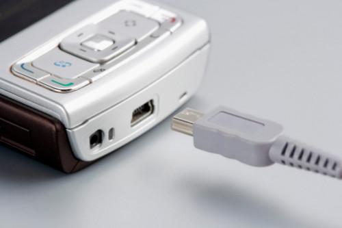 Hvorfor er USB-porten på en HTC Tilt 2 forskjellig fra vanlig USB?