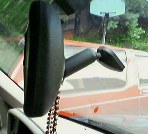 Hvordan erstatte en Ford Explorer Rear View Mirror